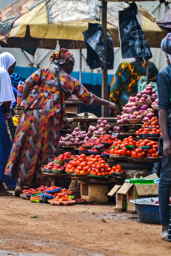 Colorful market scene in Ilorin, Nigeria with vibrant produce and local life.